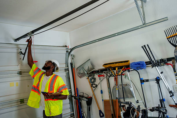 Professional Garage Door Panel Replacement technician working in Staples, MN
